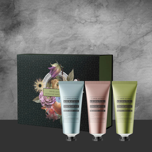 Empire Australia Aromapure set with three hydrating hand balm tubes in blue, pink, and green against decorative box